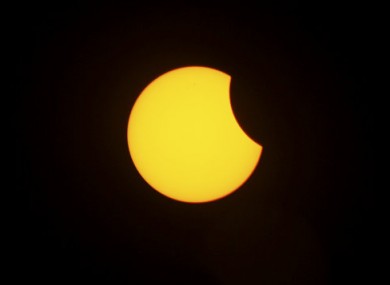 An annular solar eclipse is seen in the sky over Male, Maldives, Friday, Jan. 15, 2010.