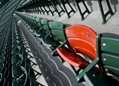 The lone red seat in the right field bleachers which signifies the spot where the longest measurable home run ever hit inside Fenway Park. Ted Williams hit the home run in 1946.
