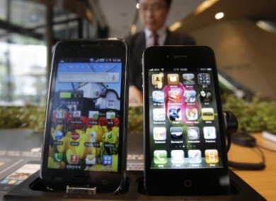 Spot the difference: Samsung's Galaxy S is on the left and Apple's iPhone 4 is on the right.