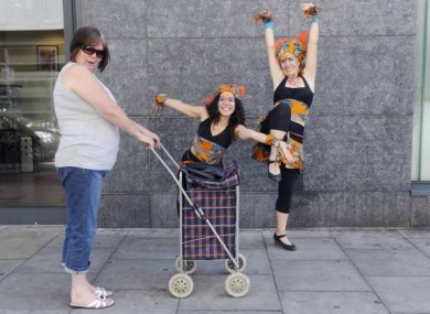 June Carthy from Cabra takes a look at Soraya Sobreiva (left) and Stephanie Lysaght from Wassa Wassa Drum Collective as they launched the Northside Music Festival 2011