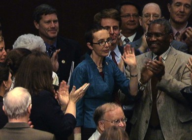 Giffords was applauded by the whole house as she returned to cast her vote.