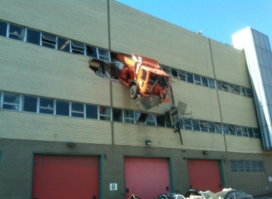 The truck hanging over the street in Queens, NYC