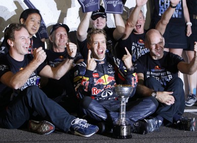 Vettel celebrates with his Red Bull team-mates