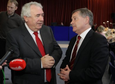 Brendan Howlin, right, speaks to Joe Costello today at Dublin Castle.