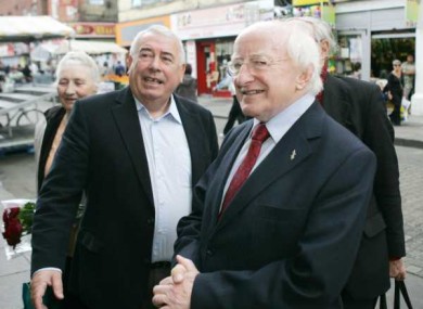 Labour's director of elections Joe Costello, pictured with Michael D Higgins on the campaign trail.