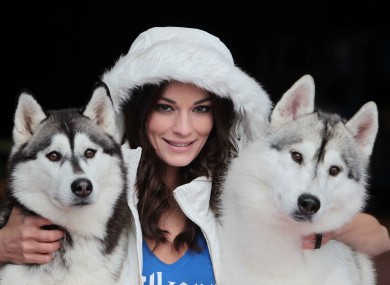 Model Karen Fitzpatrick with Siberian Huskies Michelle and Flint pictured at the opening of Kilkenny on Ice today.