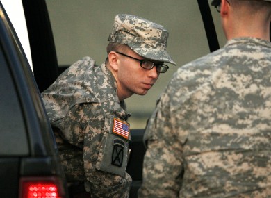 Bradley Manning is escorted from a security vehicle to a courthouse in Fort Meade in Maryland on Monday