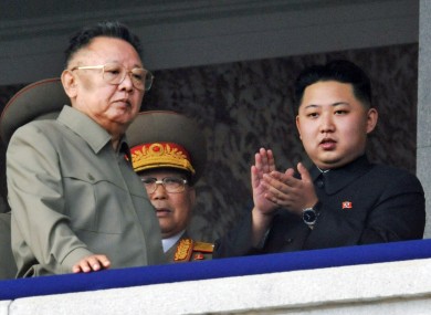 File photo of Kim Jong Un, right, along with his father and North Korea leader the late Kim Jong Il, left
