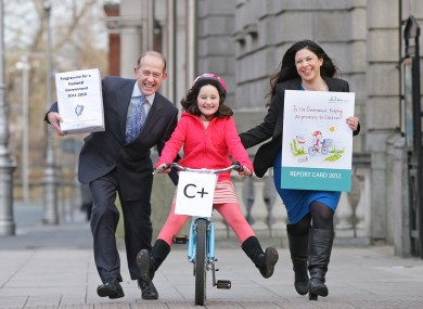 Paul Gilligan, Chair of the Children’s Rights Alliance, 8-year-old Ava Reid and Tanya Ward, Chief Executive of the Children’s Rights AlliancePic:Marc O'Sullivan.
