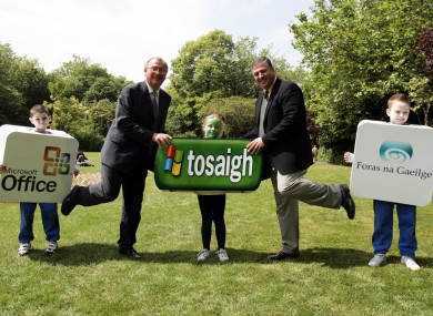 Irish language enthusiasts mark the launch of Windows XP in Irish in 2005. The Irish Language community has attacked plans to merge the Language Commissioner with the Ombudsman.