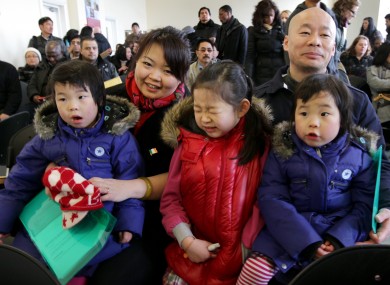 He Huang and Jun Ti Tao with daughters Ashling, Angie and Alison