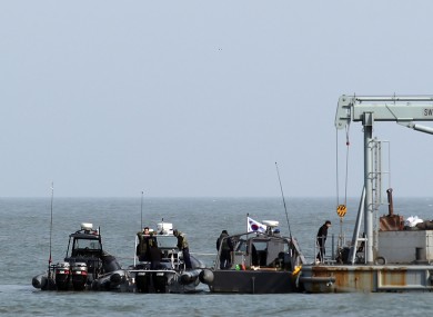 Navy sailors work at a floating base near South Korea's western Yeonpyong Island.