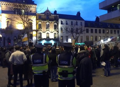 With the gardaí present, Occupy Dame Street protesters assembled outside the Central Bank tonight promising to reform in the wake of their camp being taken down earlier today.
