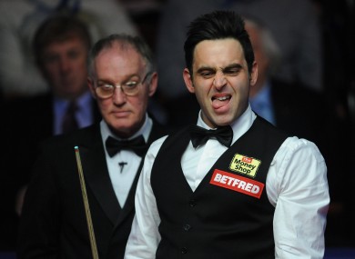 Ronnie O'Sullivan sizes up his next shot.