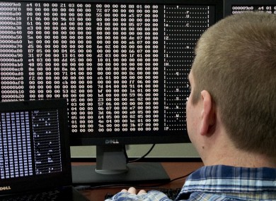 A cyber security analyst looks at code