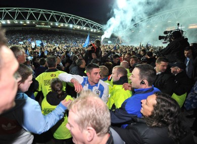 Huddersfield celebrate their promotion to League One.