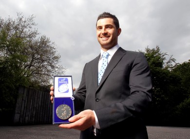 Rob Kearney proudly displays his ERC award.