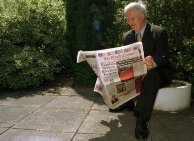 Then Taoiseach John Bruton reads the Meath Chronicle on the newspaper's 100 year anniversary in 1997