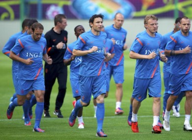 Mark van Bommel leads the Dutch training session.