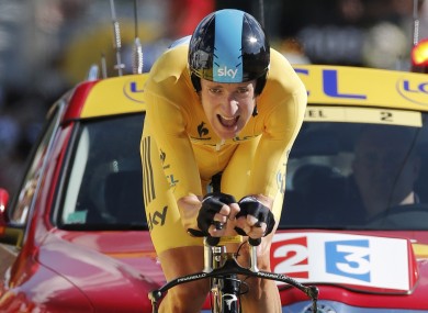 Bradley Wiggins pushes hard in the final 100 metres of Monday's stage.