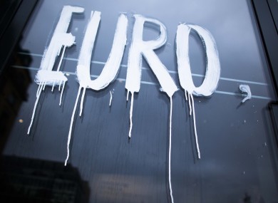 The word (painted on the window of the Academy of Arts in Berlin) is part of the slogan 'Wenn der Euro scheitert, scheitert Europa' (When the Euro collapses, Europe collapses) designed by the artist group Bureau Mario Lombardo.