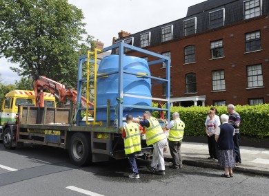 A tanker supplies water to residents in Clontarf earlier this week