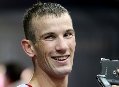 John Joe Nevin has become Ireland's first medal winner at the London Olympics.