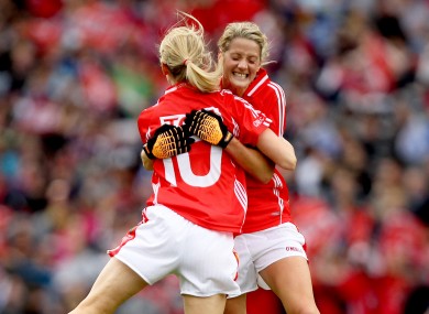 Cork's Nollaig Cleary (L) celebrates scoring the opening goal with Juliet Murphy.
