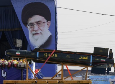 Supreme leader Ayatollah Ali Khamenei and missile