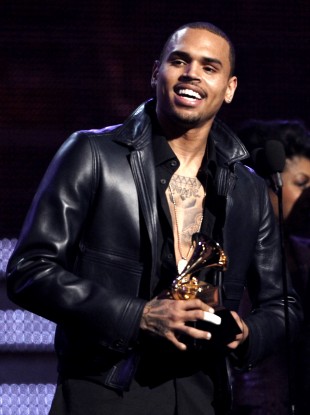 Chris Brown accepts the award for best R&B album at the Grammys in Febrary
