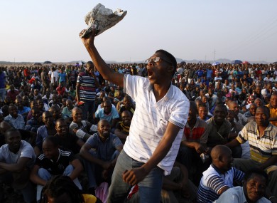 A mine worker sings and dances during a gathering at the Lonmin Platinum Mine near Rustenburg earlier this week.