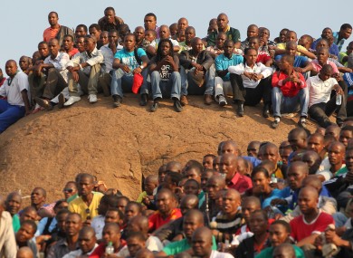 Mine workers during a memorial service at the Lonmin Platinum Mine near Rustenburg, South Africa, Thursday, Aug. 23, 2012.