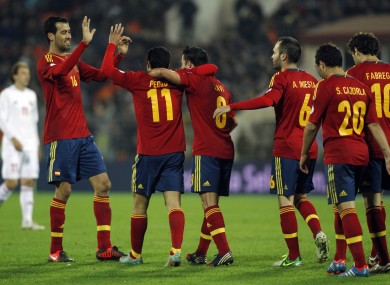 Spain's players celebrate Pedro Rodriguez's score during a World Cup 2014 Group qualification match between Belarus and Spain national teams in Minsk.