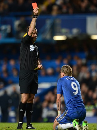 Chelsea's Fernando Torres is shown the red card and sent off by referee Mark Clattenburg on Sunday.