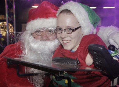 Santa with Joanne O'Riordan, who switched on the lights in Cork