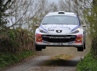 Craig Breen and Gareth Roberts in the Peugeot 207 S2000 Rally in Belfast.