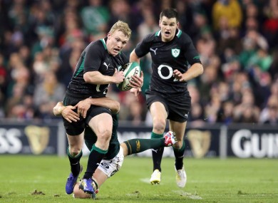 Keith Earls is stopped in his tracks by Francois Louw.