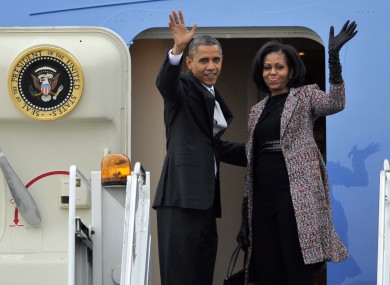 President Barack Obama and first lady Michelle Obama board Air Force One yesterday after Tuesday's election victory.