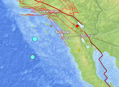 The two blue dots show the epicentres of the two earthquakes that struck off California and Mexico in the last half-hour.