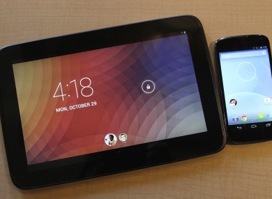 The Nexus 10 tablet, left, and the Nexus 4 smartphone are shown at a Google announcement in San Francisco.