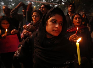 Participants at a candlelit vigil for the gang-rape victim yesterday