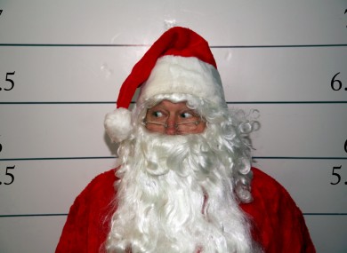 Posed pic. It's OK, kids - Santa was NOT arrested during the incident.
