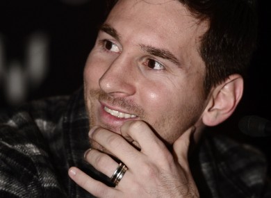 Messi attends a press conference during a promotional event at the Camp Nou.