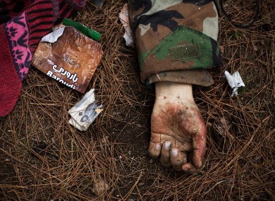 The body of a Syrian Army soldier after heavy clashes with government forces.