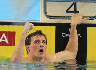 Ryan Lochte of the US reacts after his victory with a new world record 1'49''63 in the men's 200 meters individual medley final.