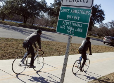 Cyclists rides along the Lance Armstrong Bikeway in Austin, Texas.