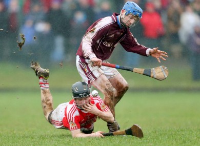 Midleton's Niall Motherway (ground) and Brian Kennedy of Templemore (standing).