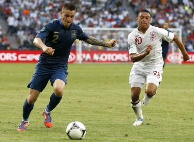 Debuchy (left) with England's Alex Oxlade-Chamberlain at Euro 2012.