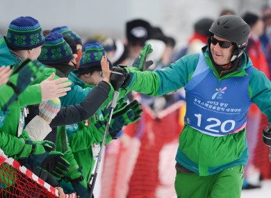 Ryan Hill celebrates with team-mates after his fourth-place performance.