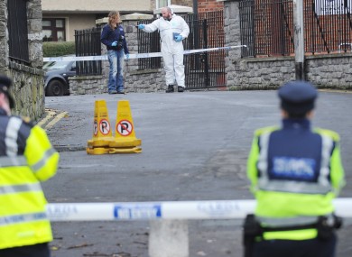 Gardaí and forensic teams investigate the shooting of Christopher Warren in the Broadstone area of Dublin